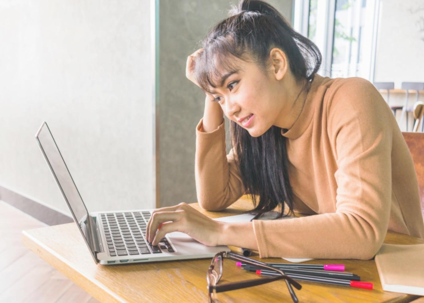 Business owner analyzing cash flow and expense reports